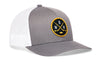 Gray trucker cap with circular logo patch, curved brim, and white mesh back.