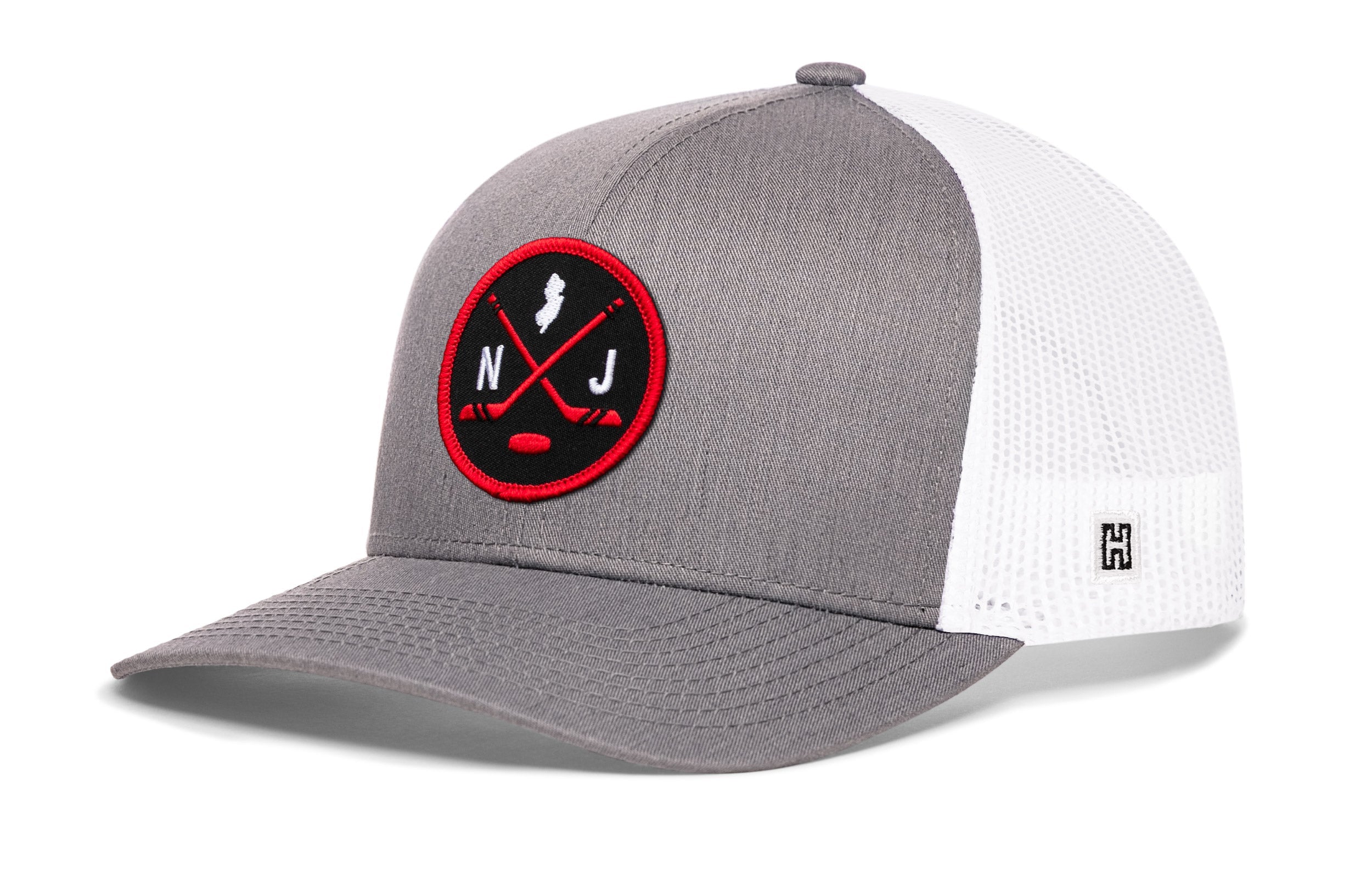 Gray hockey trucker cap with red logo patch, white mesh side panels, snapback closure
