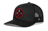 Black hockey trucker cap with red logo patch, mesh side panels, snapback strap
