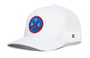 White hockey trucker hat with circular front patch, mesh back, snapback closure.