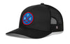 Black hockey trucker hat with circular front patch, mesh back, snapback closure.