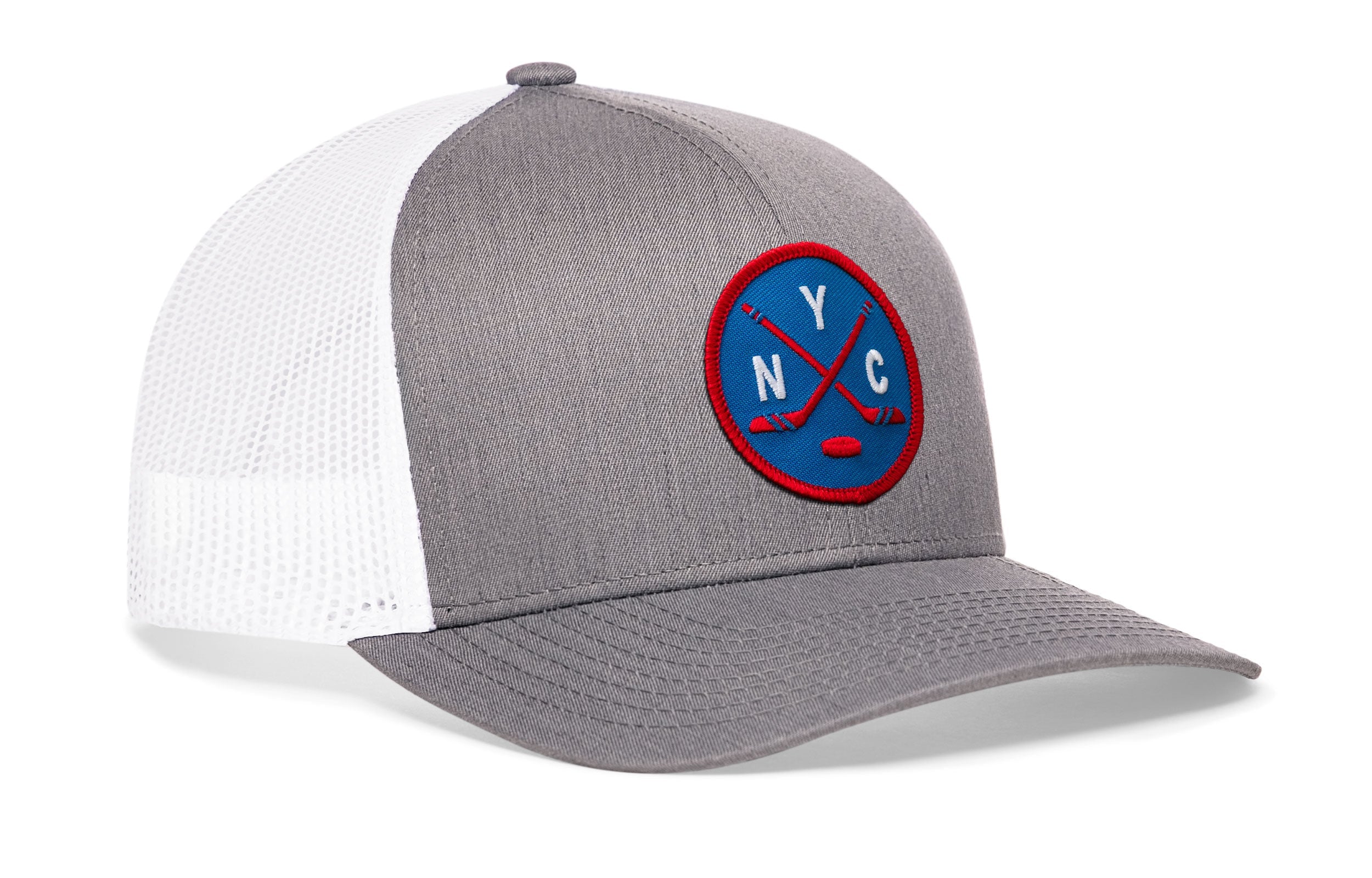 Gray and white hockey trucker hat with circular front patch, mesh back, curved brim.