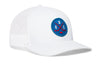 White hockey trucker cap with blue front logo patch on crown, mesh sides, curved brim