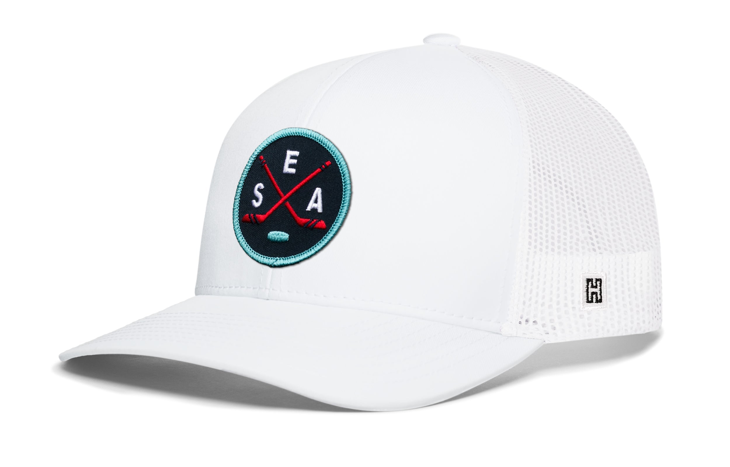 White snapback trucker hat with mesh back and circular SEA X logo patch