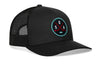 Black trucker hat with black mesh sides, curved brim, and SEA X logo patch