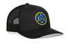 Black trucker hat with front logo patch and mesh back panels.