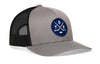 Gray trucker snapback hat with black mesh side, blue logo patch, and H emblem.