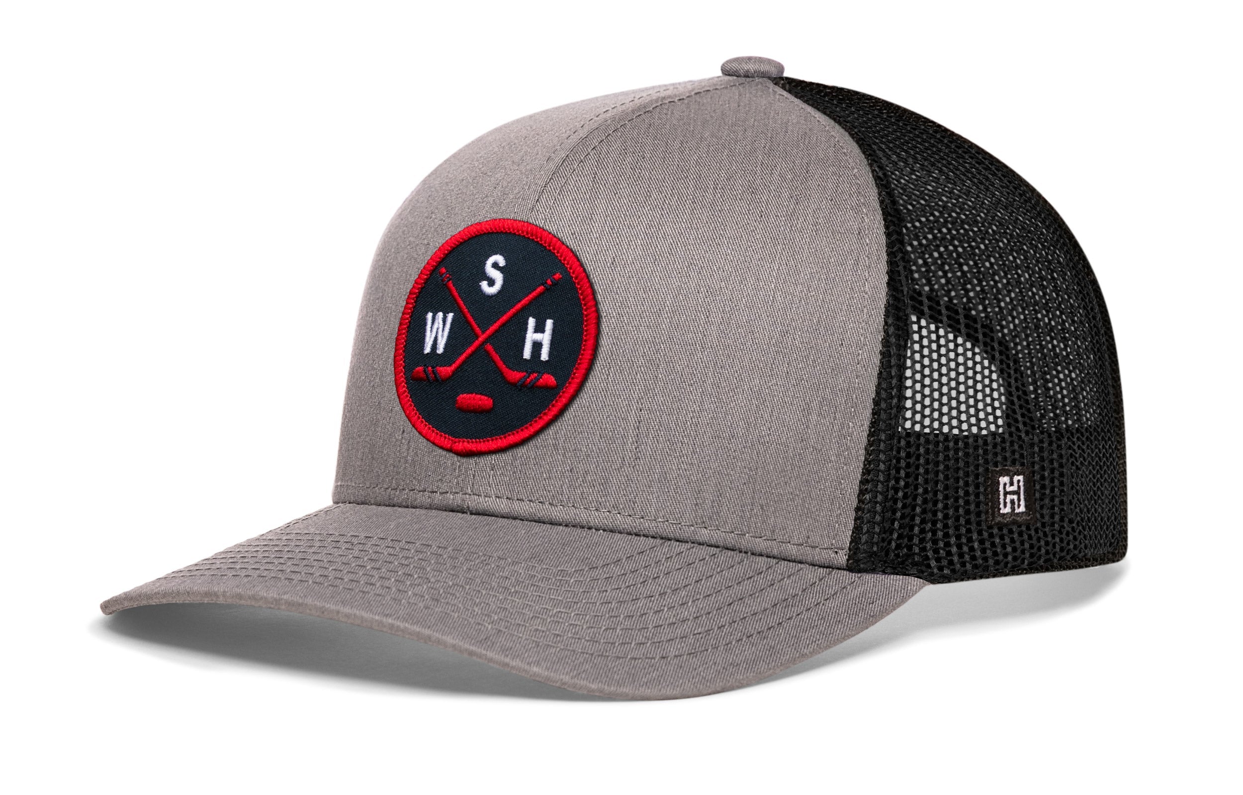 Gray and black trucker cap with red-and-white logo patch and mesh side panels.
