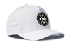 White 5-panel cap, side view with perforated panels and round NOLA logo patch