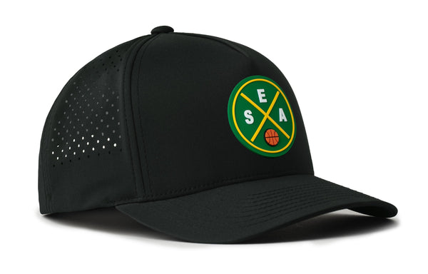 Black performance baseball cap with green round basketball logo patch and dotted ventilation panels