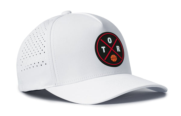 White 5-panel snapback hat with TR logo patch and perforated dot panel on side.