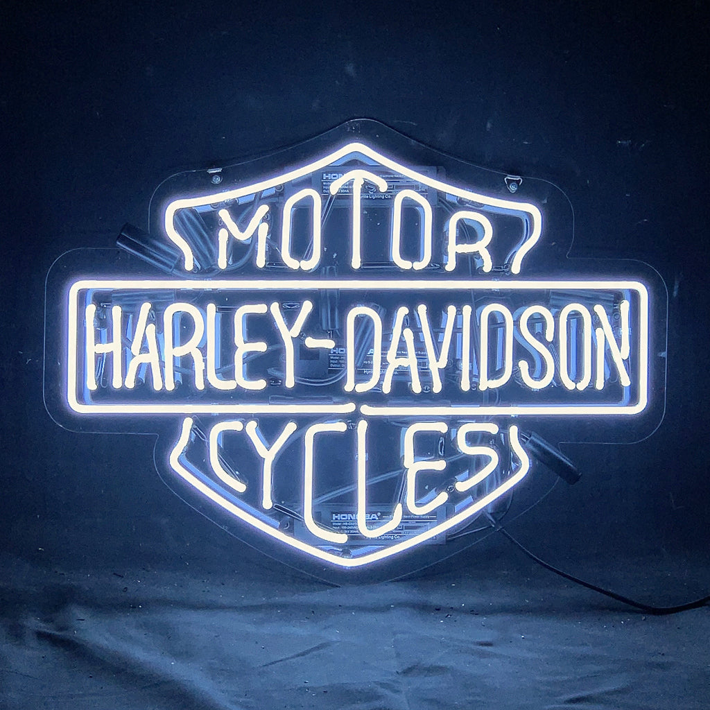 Harley-Davidson motorcycle neon sign with bright white-blue glow and connected cable