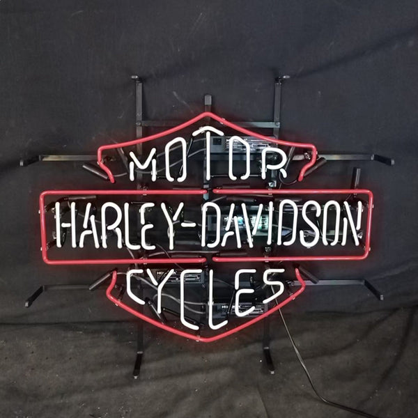 Mounted neon motorcycle sign with red outline, blue MOT0R? and CYCLES, white Harley-Davidson