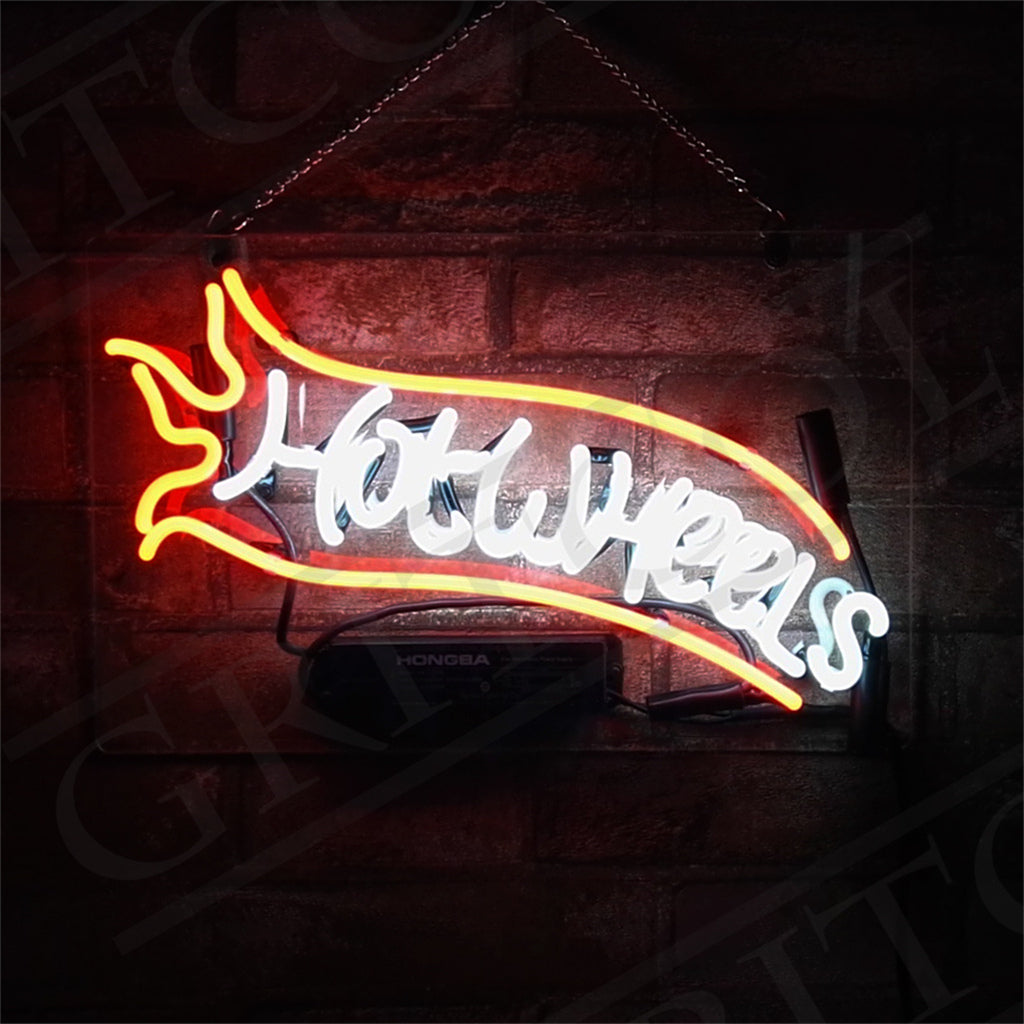 Hot Wheels neon sign with yellow flame icon and white script text on black base
