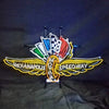 Neon motor speedway sign light with winged graphics, checkered badge, and mounted stand