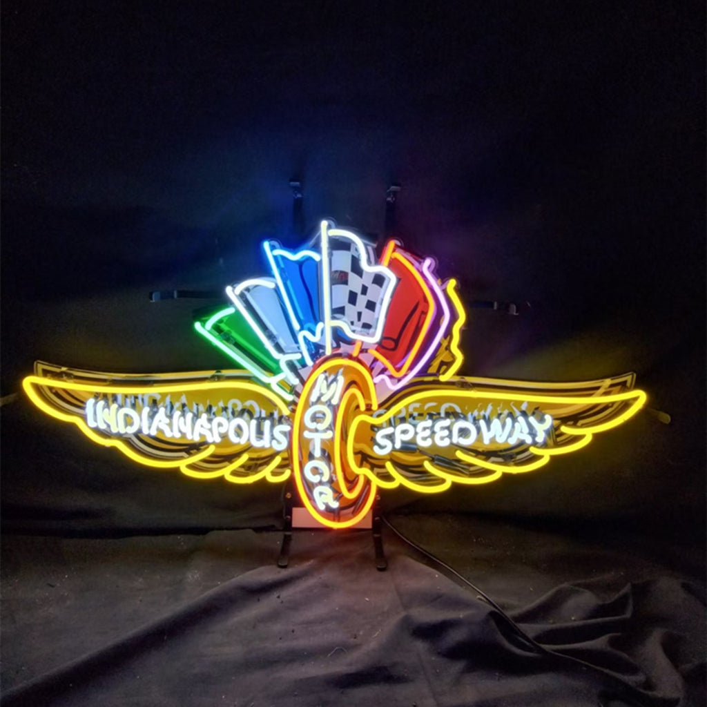 Neon motor speedway sign light with shield, wheel, wings, and multicolor lettering on a stand