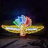 Neon motor speedway sign light with shield, wheel, wings, and multicolor lettering on a stand
