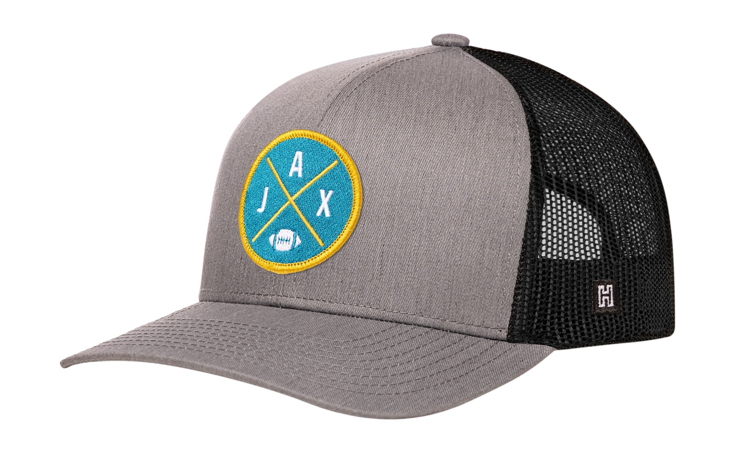 Gray snapback trucker hat with circular team patch and black mesh side panels