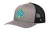 Gray snapback trucker hat with circular team patch and black mesh side panels