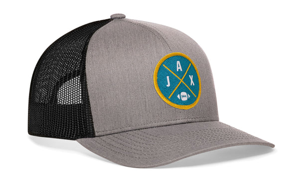 Gray trucker hat with circular team patch and black mesh side panels