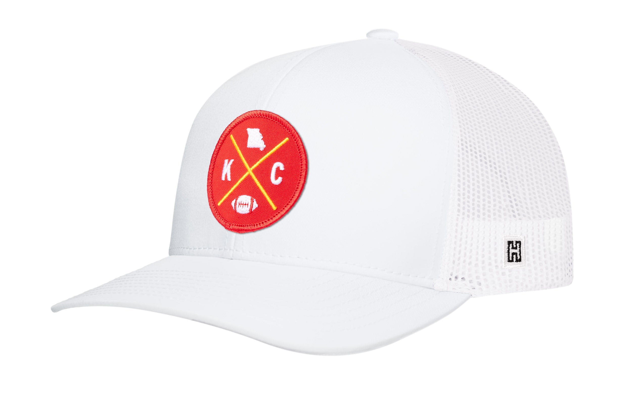 White trucker cap with red round logo patch and white mesh side panels