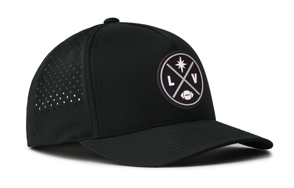 Black 5-panel snapback cap with LV crest patch, perforated side panels, curved brim.