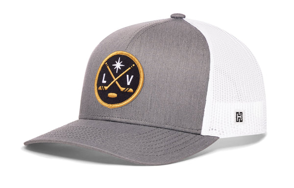 Heather gray and white trucker hat with circular LV hockey logo patch, mesh sides, brim.