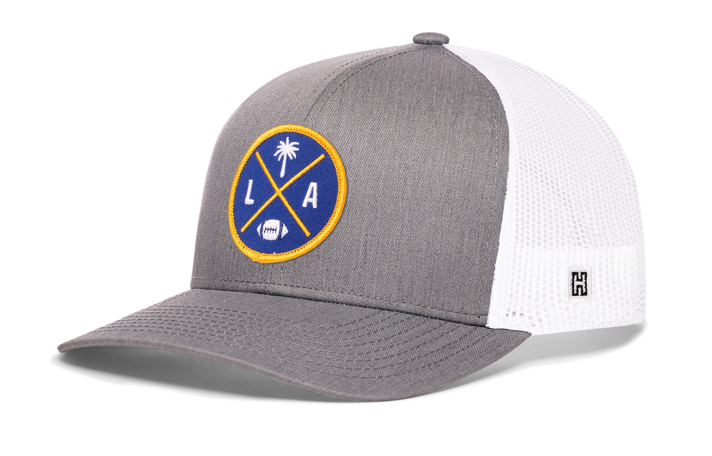 Gray-and-white trucker cap with mesh side panels and LA X logo patch