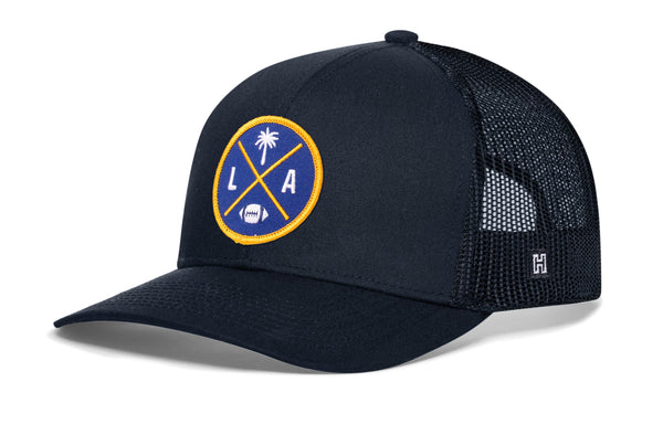 Navy trucker cap with mesh side panels and round LA X logo patch