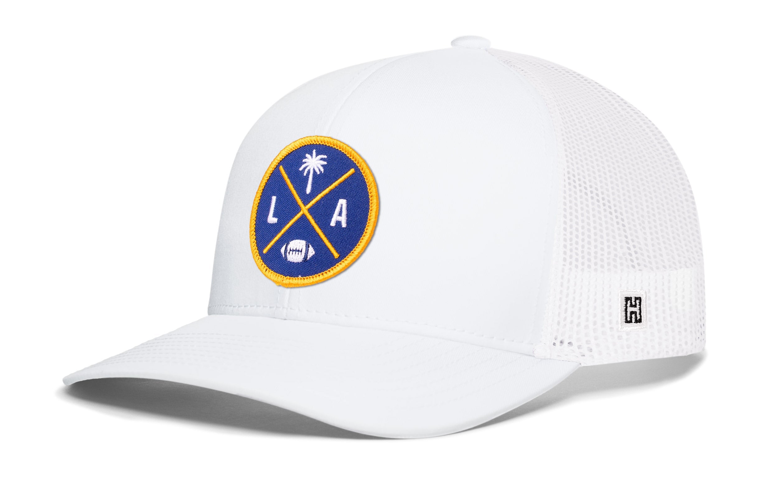 White trucker cap with mesh side panels and round LA X logo patch