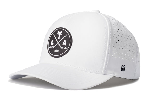 White 5-panel performance cap with LAX patch, perforated side panels, curved brim