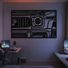 Metal neon frame wall art featuring a vehicle front grille design, black with light accents.