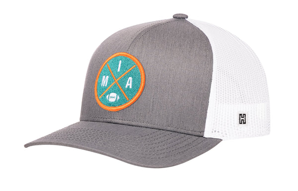 Gray trucker cap with white mesh back, curved brim, circular MIA patch on front