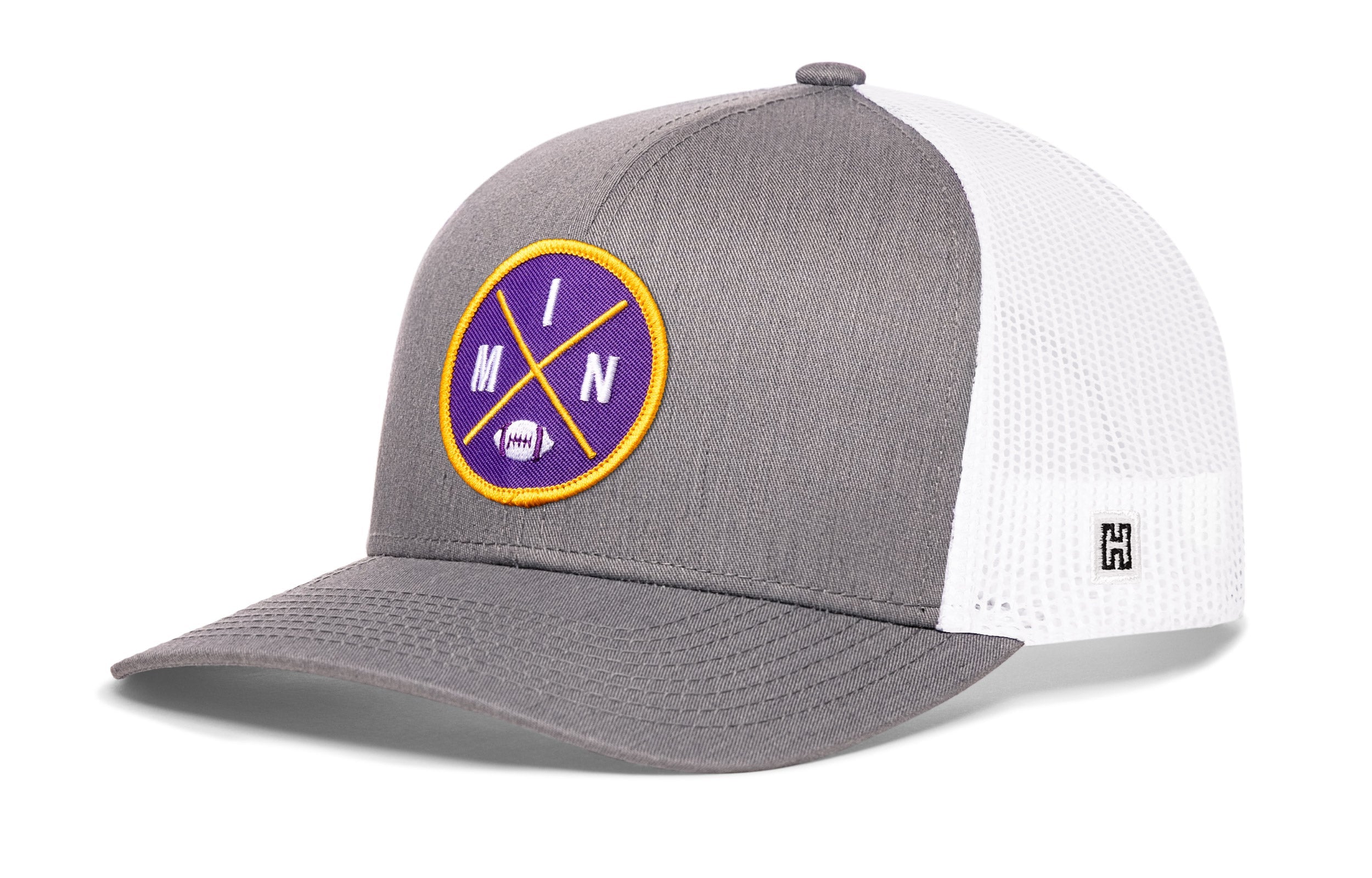 Gray and white trucker cap with front circular patch and mesh side panels