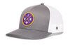 Gray and white trucker cap with front circular patch and mesh side panels
