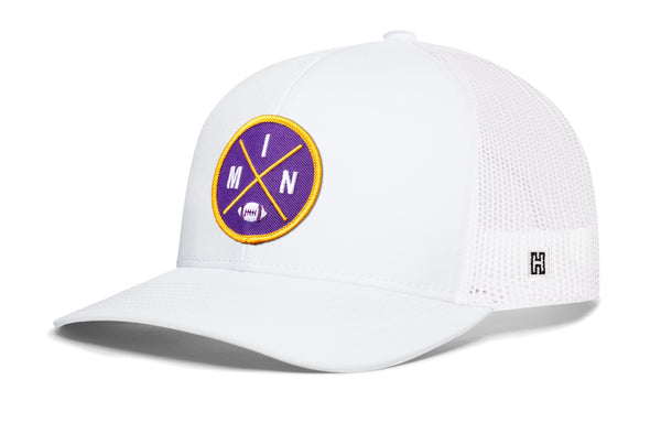 White trucker cap with front circular patch and white mesh side panels