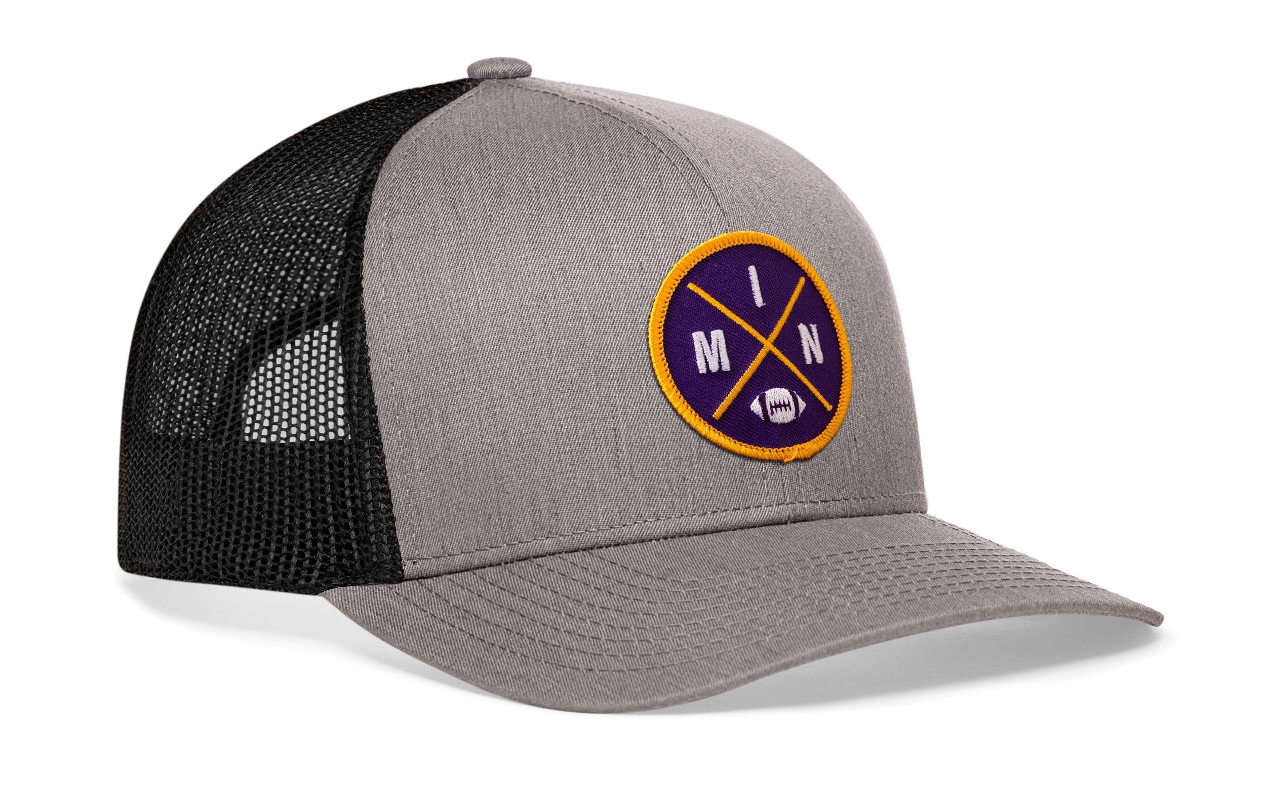Gray trucker cap with front circular patch and black mesh side panels