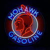 Circular neon sign light with red/orange face portrait, blue curved text, and glowing ring