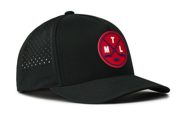 Black 5-panel baseball cap, side view, with circular logo patch and perforated panel