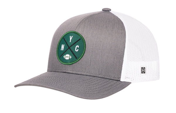 Gray-and-white trucker snapback hat with green NYC patch and mesh side panels, H logo