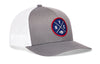 Light gray trucker snapback hat, side view with round logo patch and white mesh