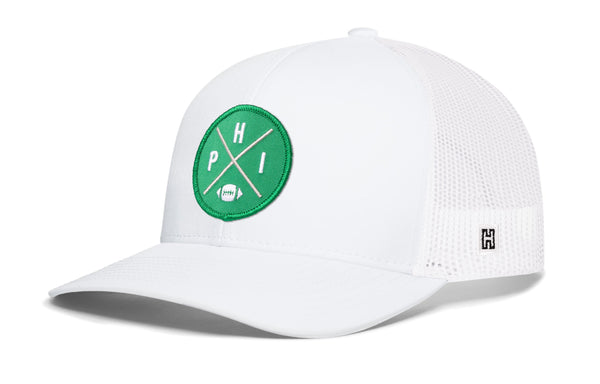 Philadelphia football trucker hat, white front with green logo patch and mesh back snapback
