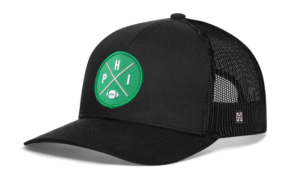 Philadelphia football trucker hat, black front with green logo patch and mesh back snapback