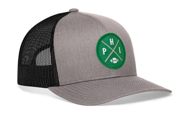 Philadelphia football trucker hat, gray front with black mesh back and green logo patch snapback