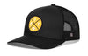 Black trucker snapback hat with yellow logo patch and mesh side panels