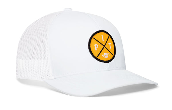 White trucker snapback hat with yellow round logo patch and mesh side panels