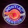 Neon Pontiac service sign showing purple/blue ring, red head, and white border