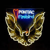 Neon Pontiac Firebird wall sign, blue plate, winged flame outline, yellow and white glow
