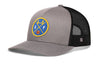 Gray front trucker cap with basketball-style logo patch and black mesh side panels