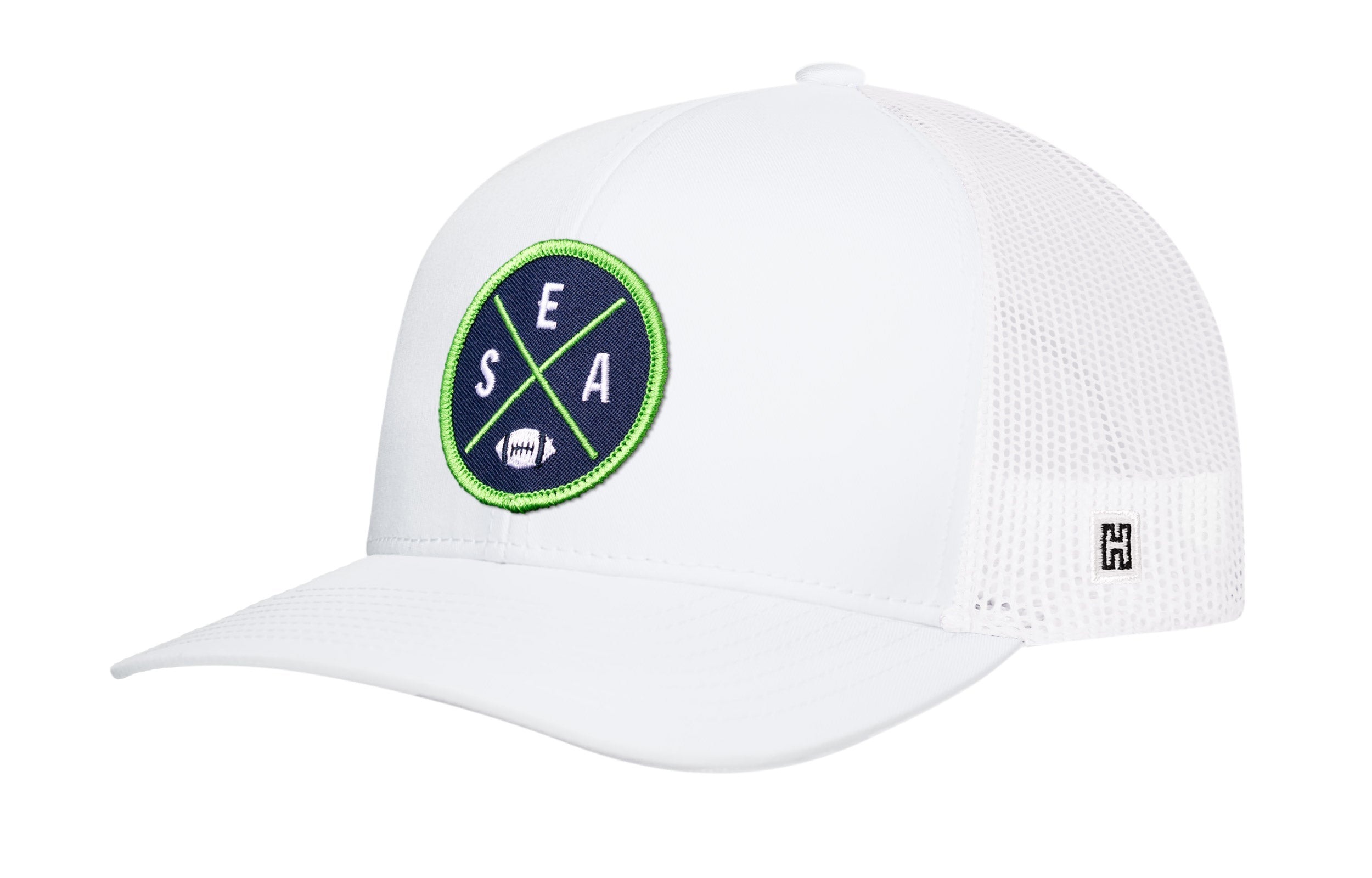 White trucker baseball cap with green SEA X A logo patch and mesh back snapback